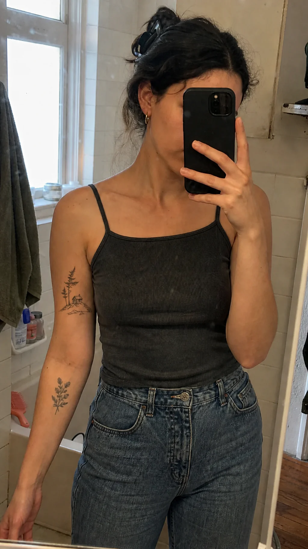Cabin and pine tree tattoo preview placed on the upper arm